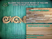 Load image into Gallery viewer, a picture of some wood carvings on a wall