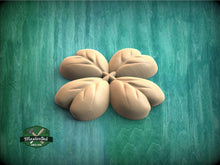 Load image into Gallery viewer, A 3D rendering of a four-leaf clover against a green background.