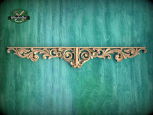 Load image into Gallery viewer, a decorative wooden panel with an intricate, ornate design on a green background.