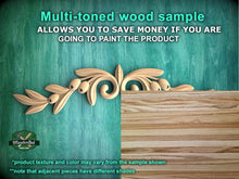 Load image into Gallery viewer, a picture of a wood carving of a plant