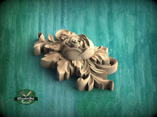 Load image into Gallery viewer, A wooden carving of a flower with intricate details is displayed against a green background.