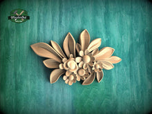 Load image into Gallery viewer, A decorative wooden flower piece is displayed against a green textured background.