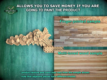 Load image into Gallery viewer, a picture of some wood carvings on a wall