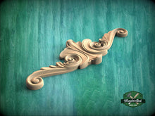 Load image into Gallery viewer, a wooden door handle on a green background