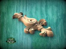Load image into Gallery viewer, A wooden carving of a decorative finial or finial-like object is displayed against a green textured background.