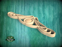 Load image into Gallery viewer, a wooden model of a canoe on a green background