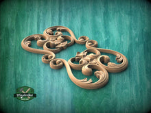 Load image into Gallery viewer, A 3D rendering of an ornate, carved wooden design with intricate scrollwork and floral motifs, set against a green background.
