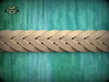 Load image into Gallery viewer, A close-up view of a braided wooden object, possibly a piece of furniture or a decorative item, set against a green and blue textured background.
