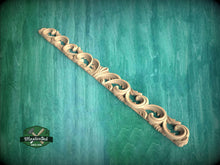 Load image into Gallery viewer, a wood carving pattern on a green background