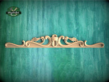 Load image into Gallery viewer, a wooden shelf with a decorative design on it
