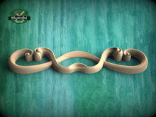 Load image into Gallery viewer, A wooden sculpture with a curved, organic shape is displayed against a teal-colored background.