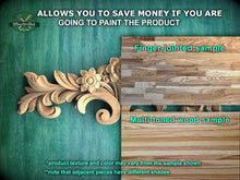 Load image into Gallery viewer, a wood carving of a flower and leaves