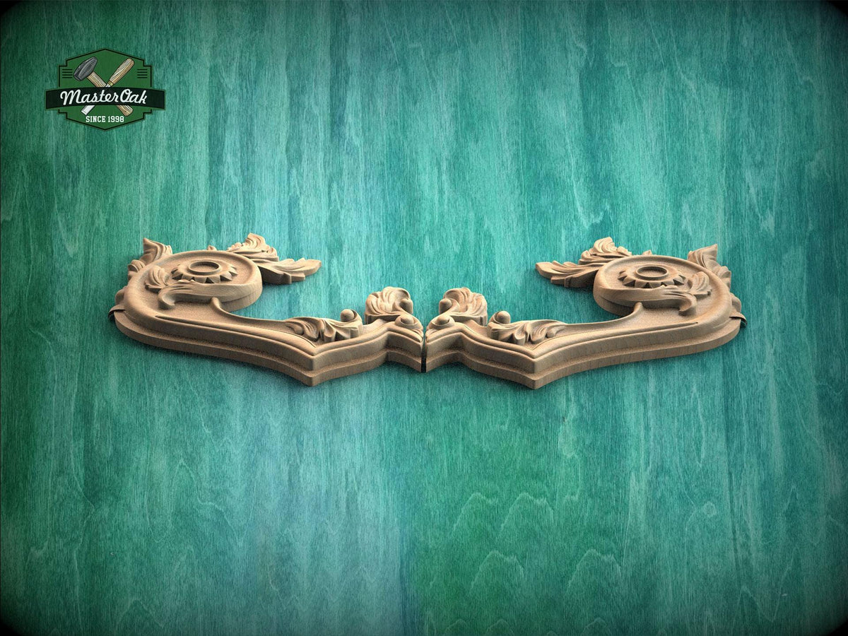 two ornate wooden carvings with intricate designs, displayed against a green textured background.