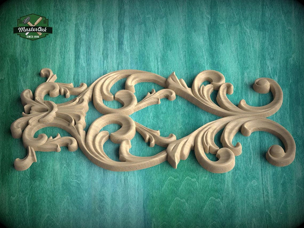 a decorative wooden carving with intricate scrollwork and floral patterns, set against a green textured background.