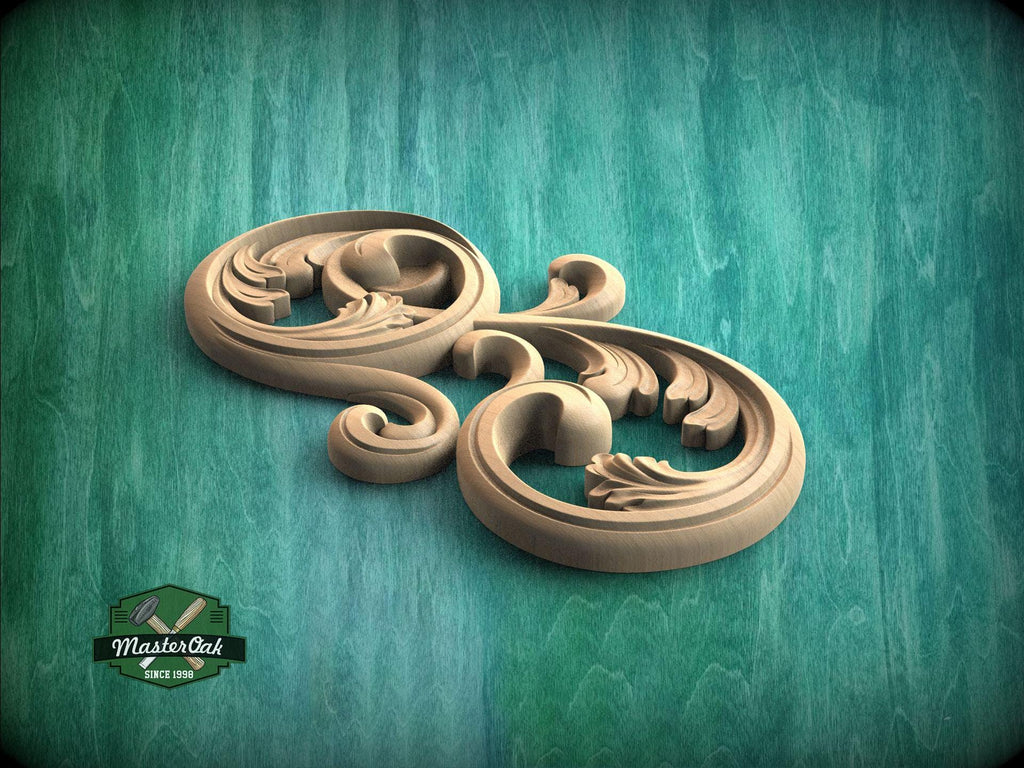 A decorative wooden carving in the shape of a swirl or scroll is displayed against a teal-colored background.