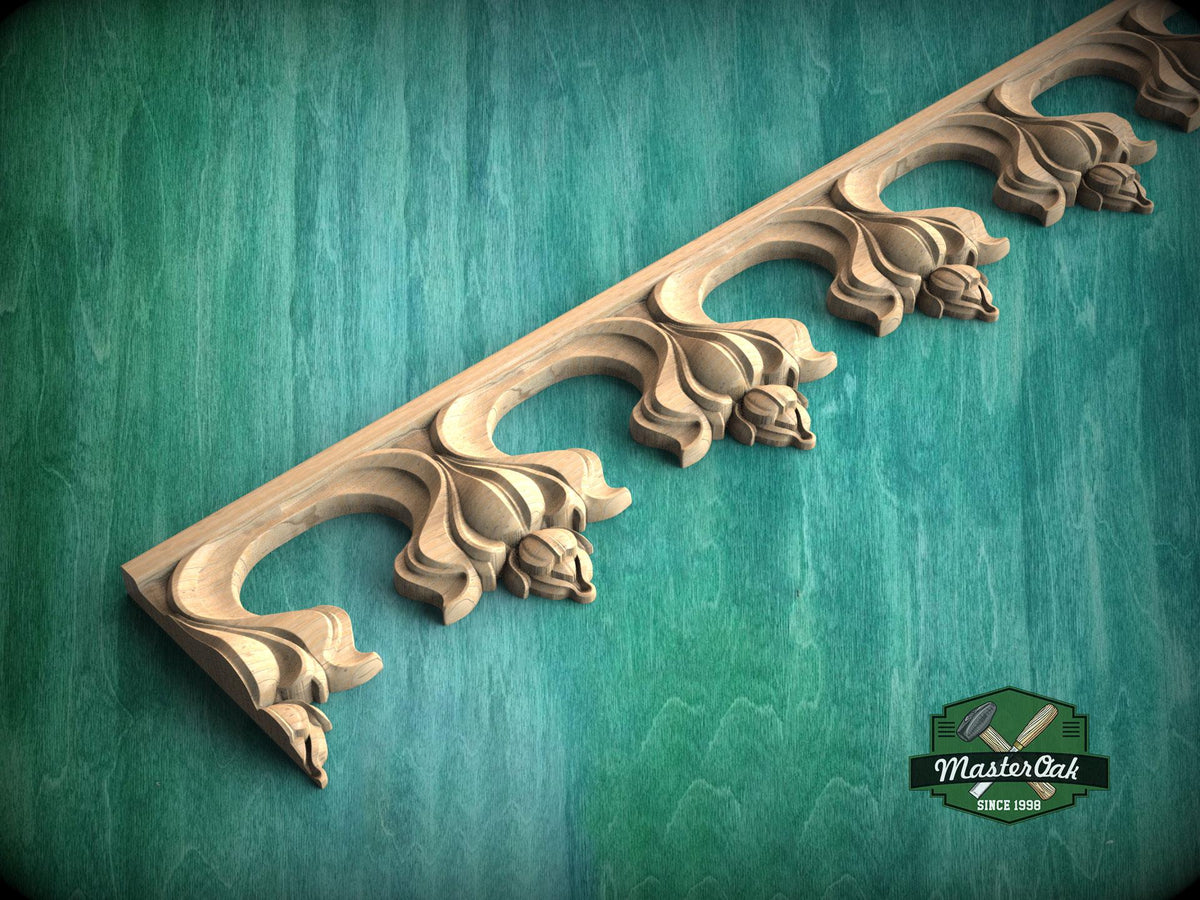 Carved wooden gothic molding with repeating arch and floral pattern, used as decorative trim for cabinets, furniture or wall panels.