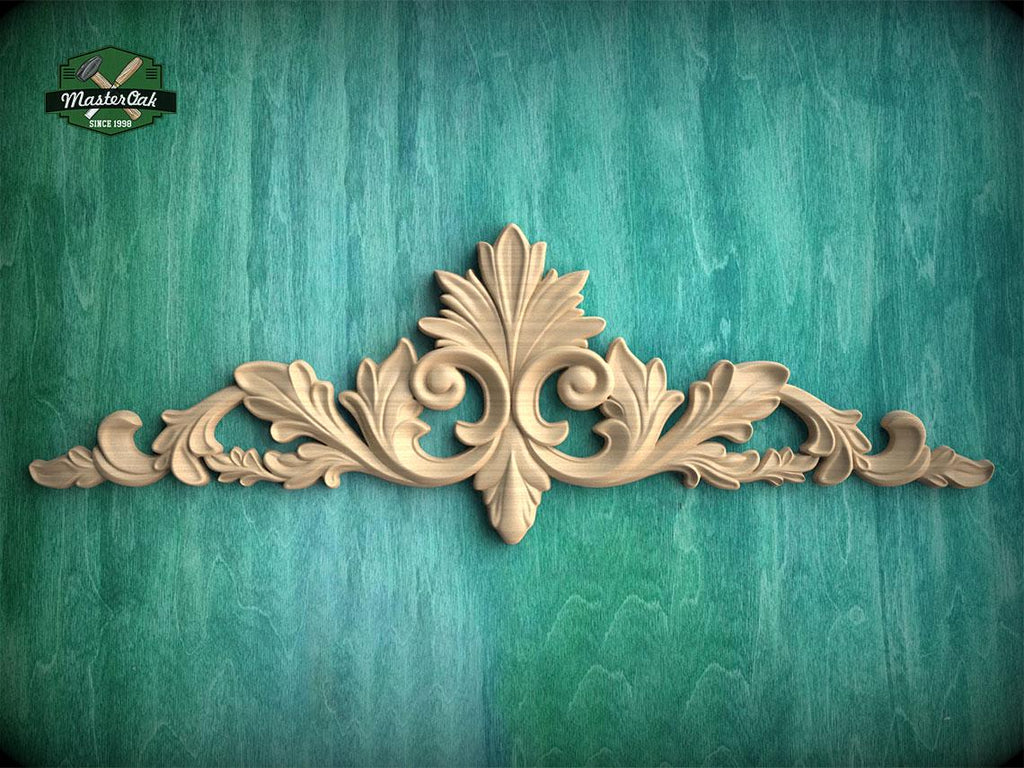 a decorative wooden carving on a green background.