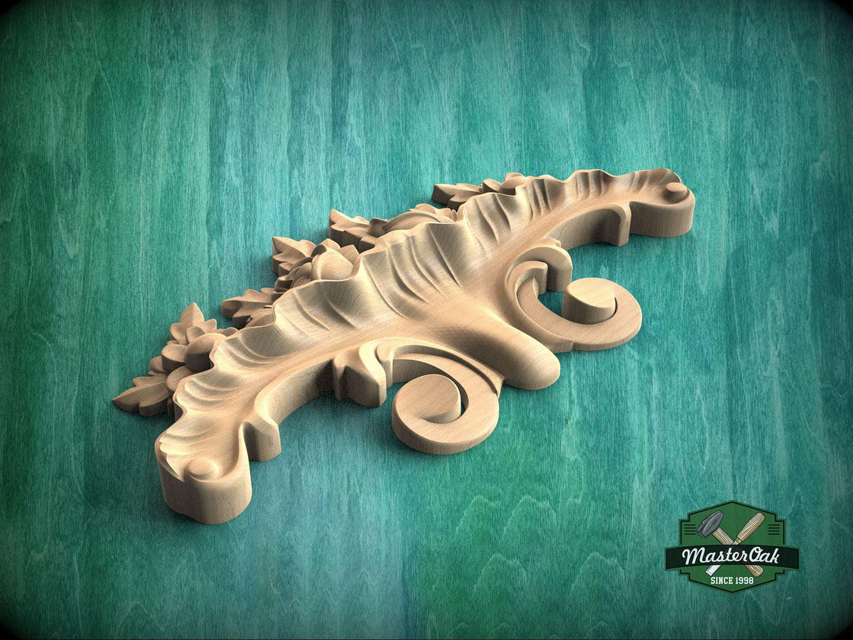 A wooden carving with intricate scrollwork is displayed against a green background.