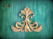 Load image into Gallery viewer, a decorative wooden carving on a green background.
