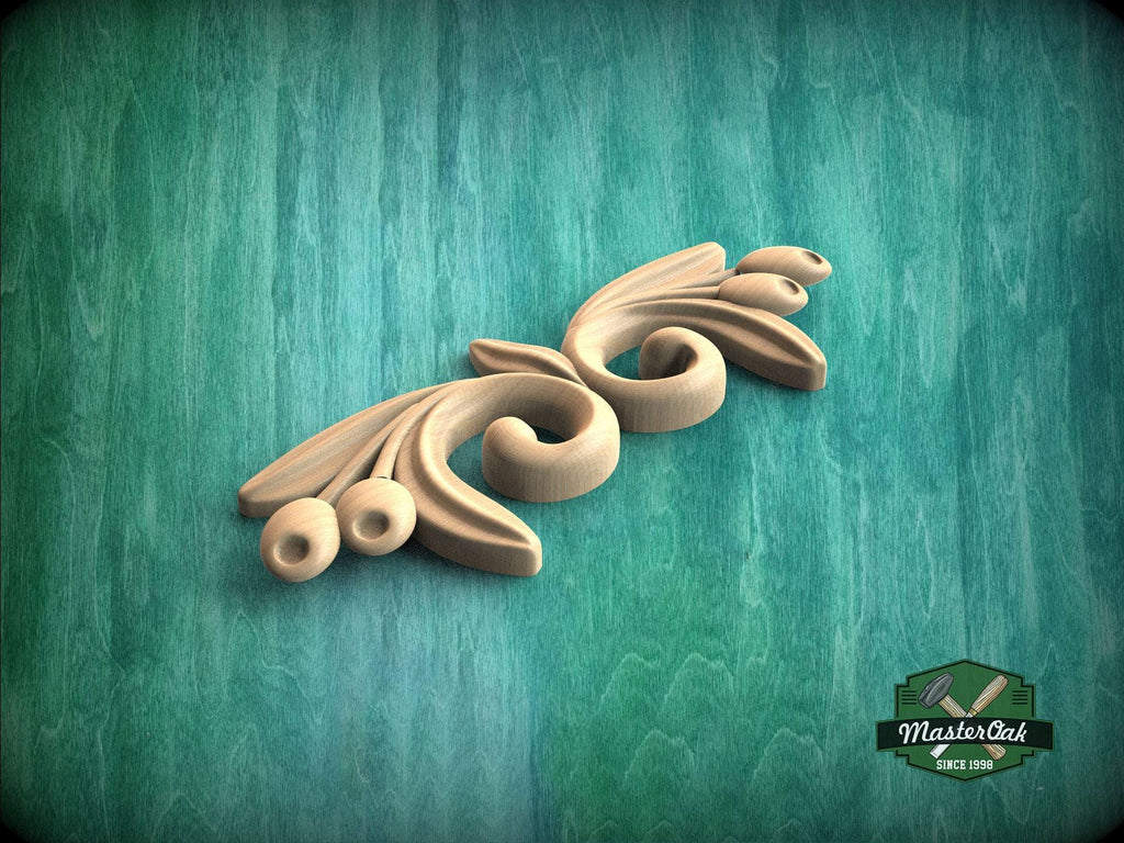 A wooden carving with a floral design is displayed against a green background.
