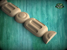 Load image into Gallery viewer, A wooden object with a curved shape and a hole in the center, arranged in a row against a green background.
