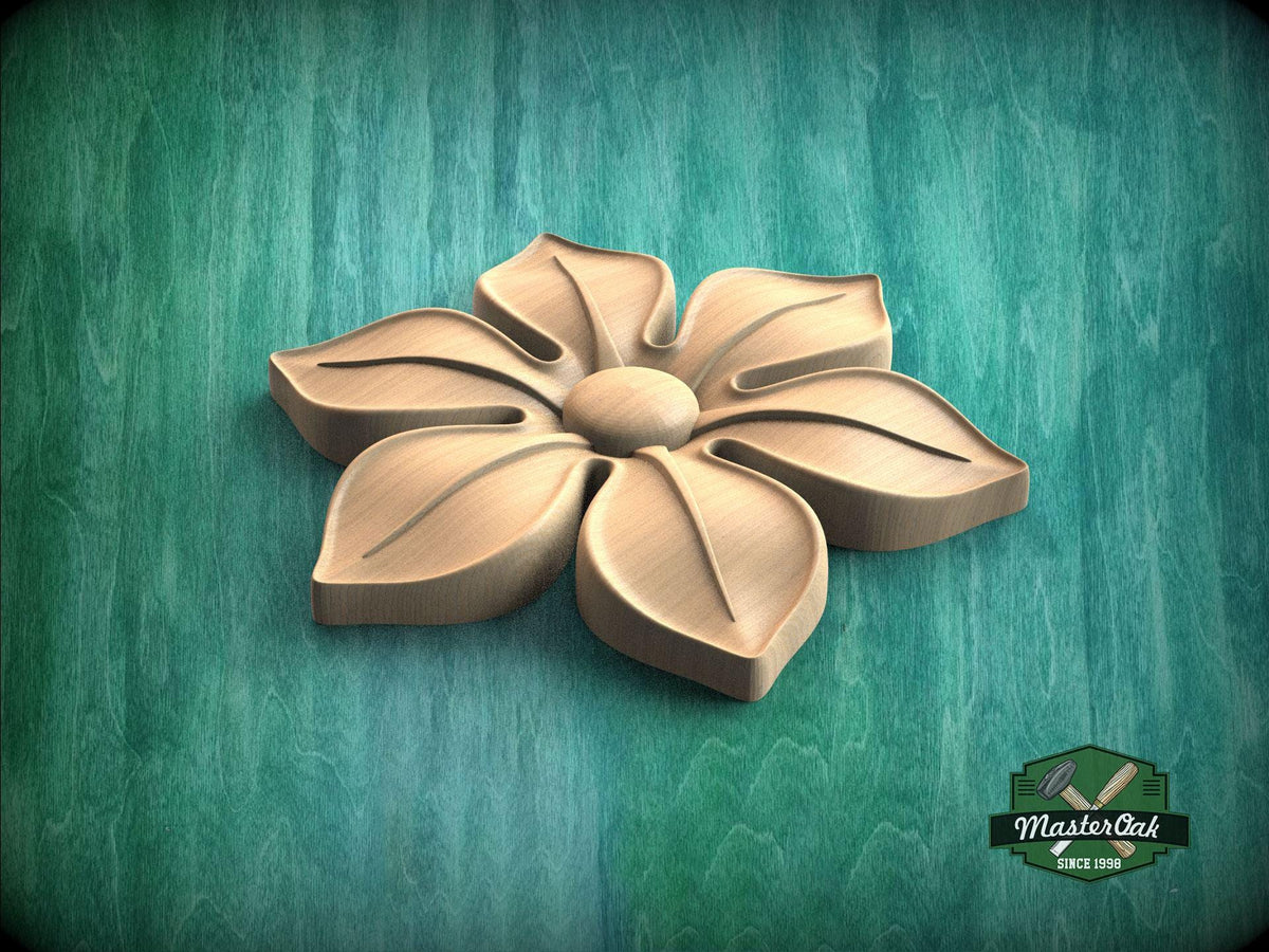 A wooden flower-shaped object is displayed against a green background.