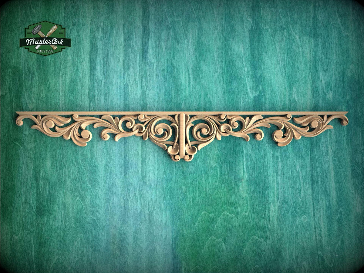 a decorative wooden panel with an intricate, ornate design on a green background.