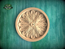 Load image into Gallery viewer, A wooden ornate flower design in a round bowl, set against a green background.
