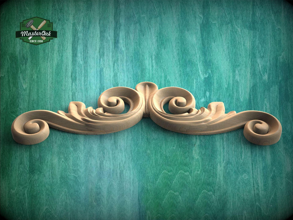 A decorative wooden scroll or ornament with a swirling, organic design is displayed against a textured green background.