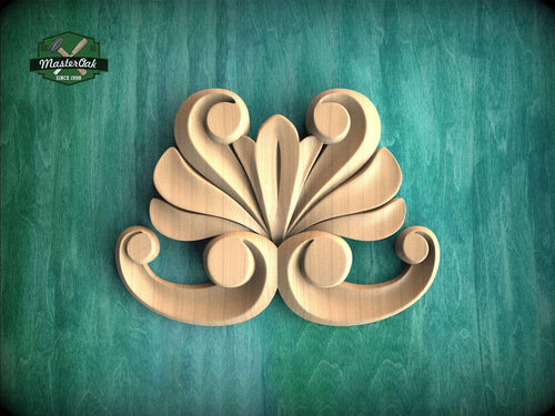 A wooden carving of a stylized flower or leaf design is displayed against a teal background.