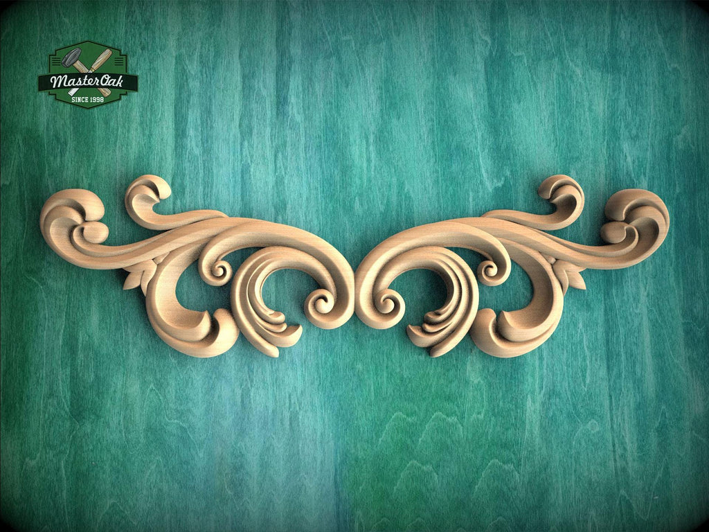 a wooden carving of an ornate design on a green background
