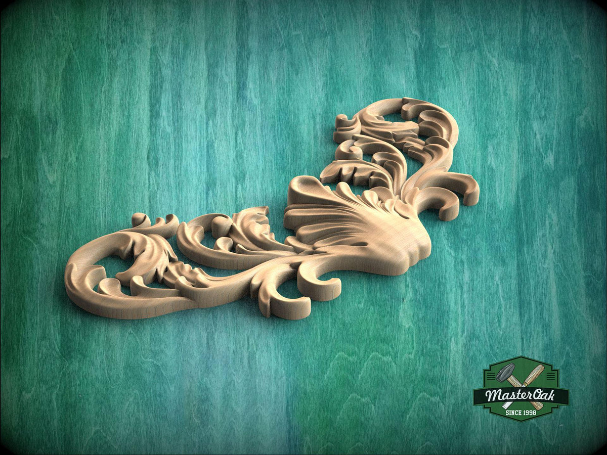 A decorative wooden carving with intricate scrollwork is displayed against a green background.