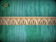Load image into Gallery viewer, a decorative border made of carved wood, set against a textured green background.

