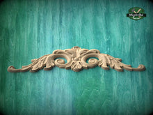 Load image into Gallery viewer, A decorative wooden carving in the shape of a fan or scroll is displayed against a teal-colored background.
