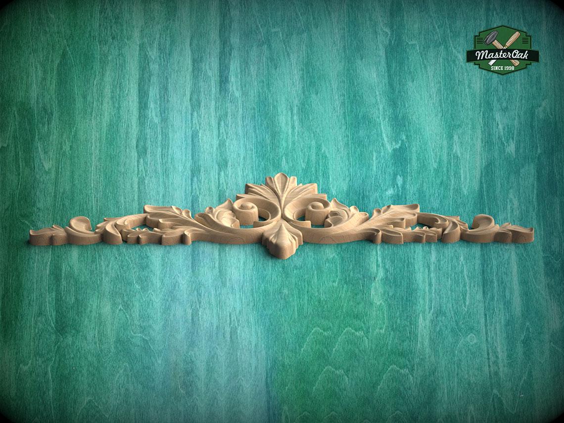 A decorative wooden carving with an intricate floral design is displayed against a textured green background.