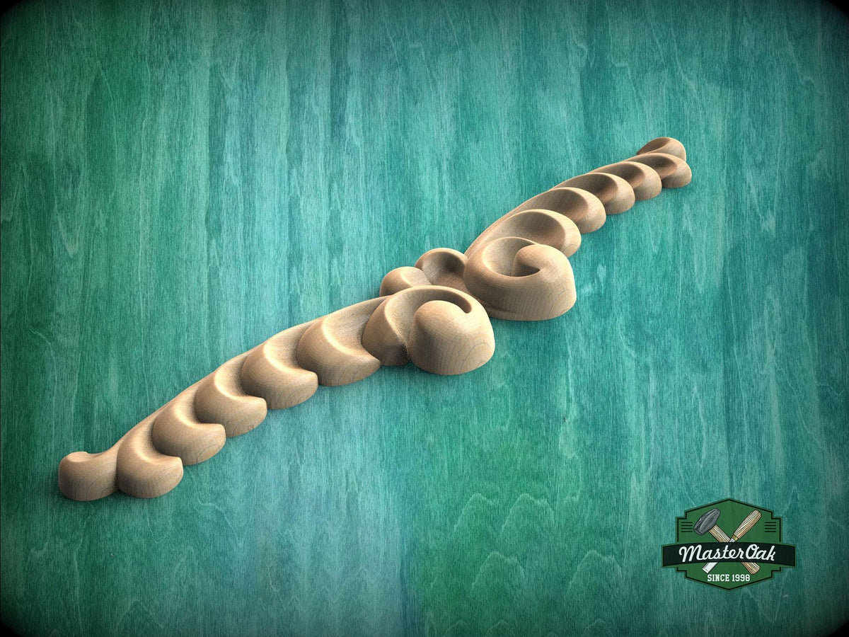 A wooden carving with a curved, ornate design is displayed against a green background.