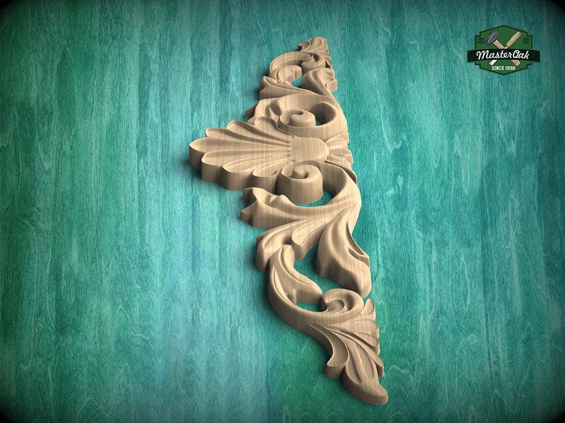 A decorative wooden carving with an intricate floral design is displayed against a green textured background.