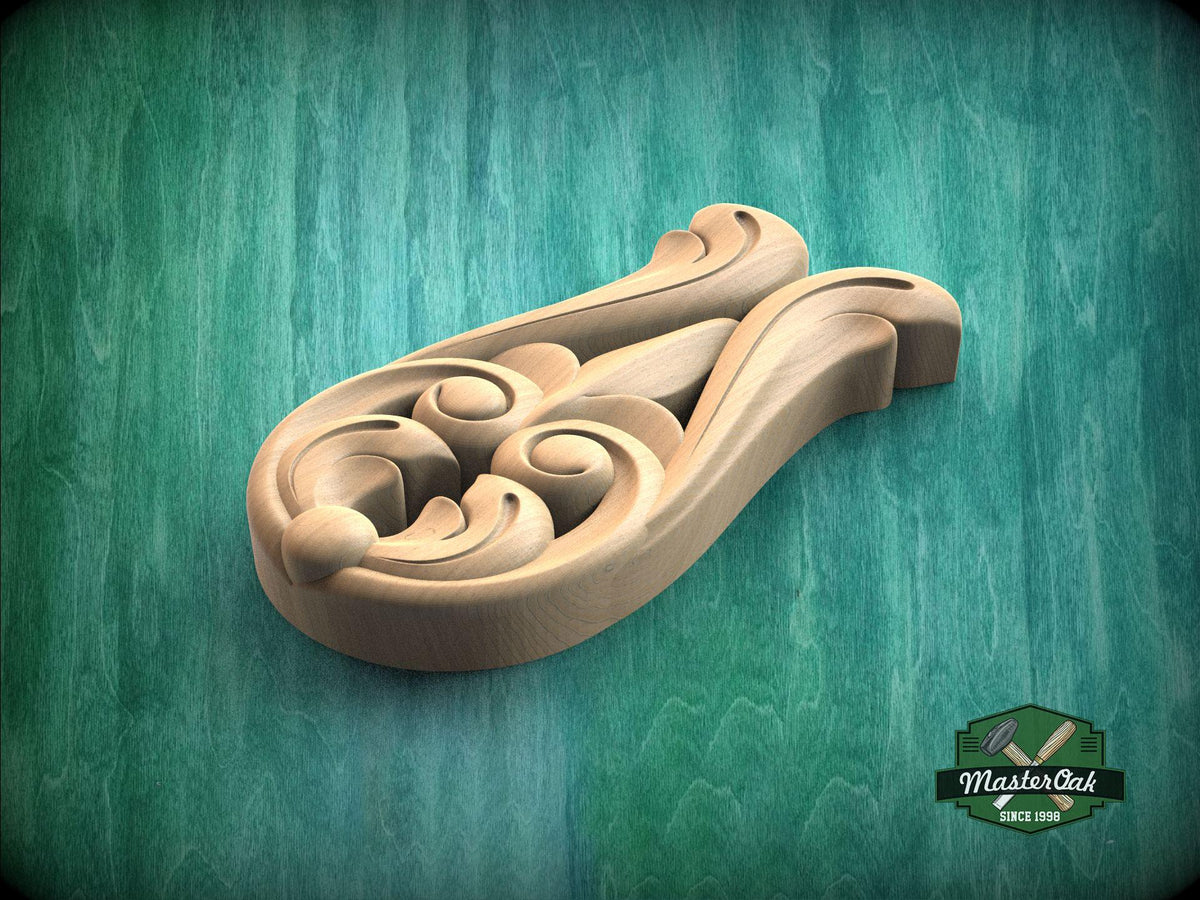 A wooden carving with intricate scrollwork is displayed against a green background.