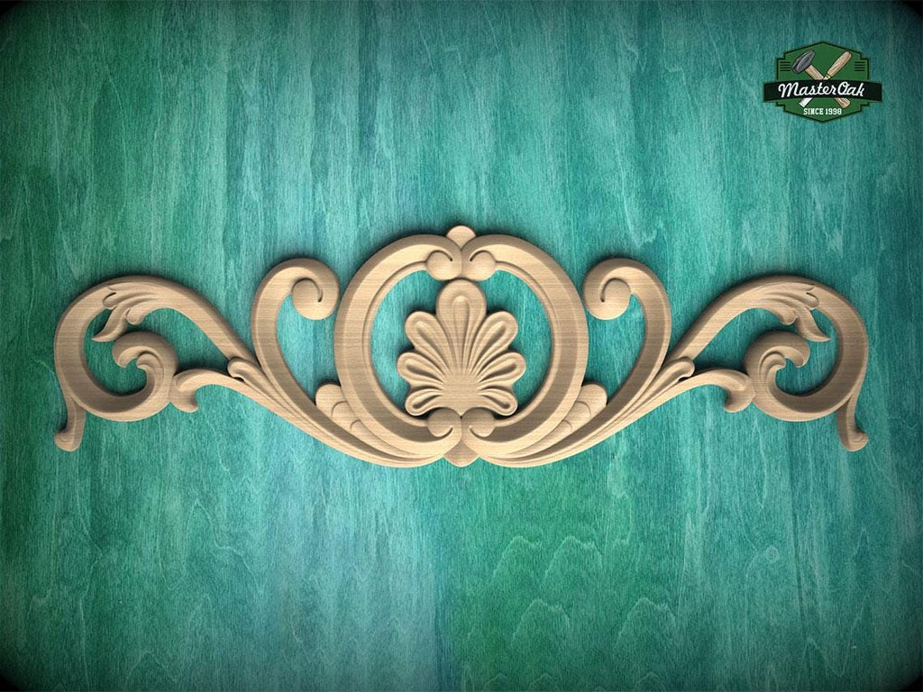 a decorative wooden carving on a green background.