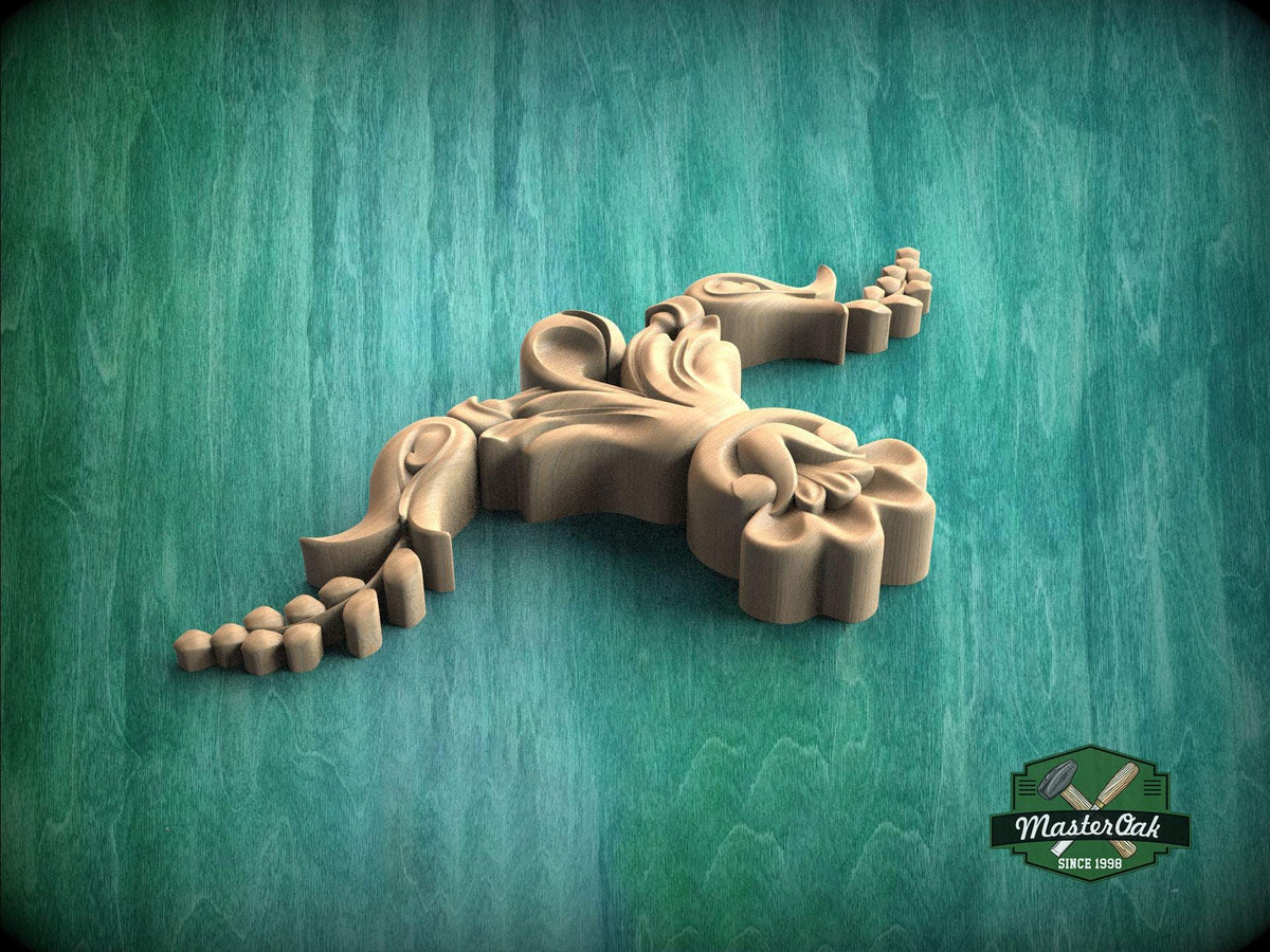 A wooden carving of a stylized flower or plant is displayed against a green background.