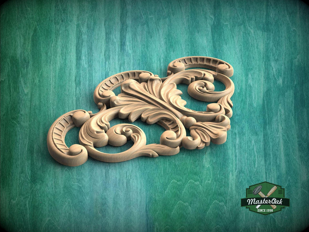 a wood carving of an ornate design on a green background