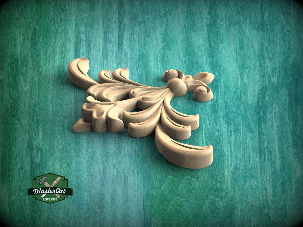 A wooden carving of a stylized flower or leaf design is displayed against a green background.