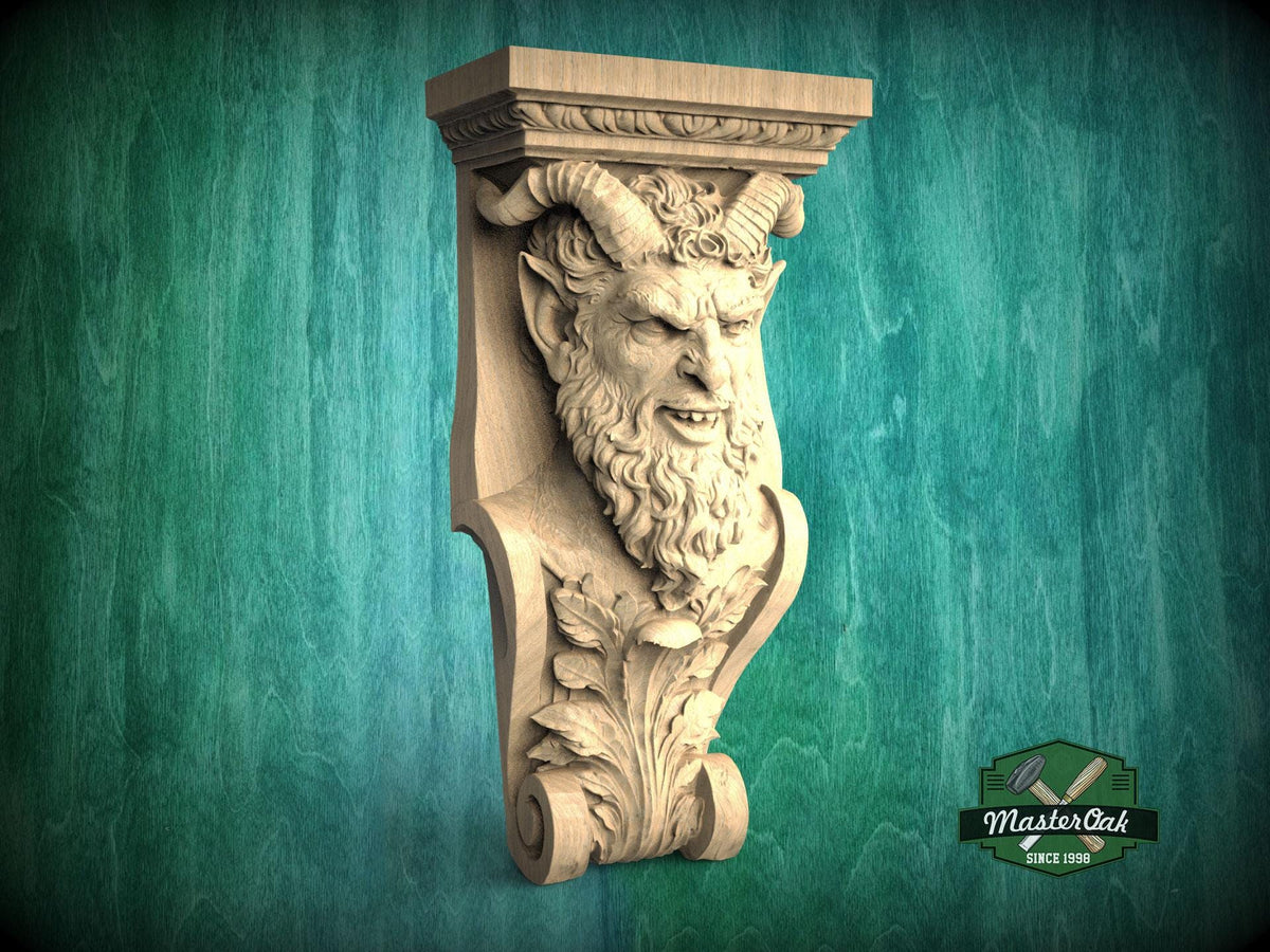 A carved stone sculpture of a fierce-looking face with horns, displayed against a green background.