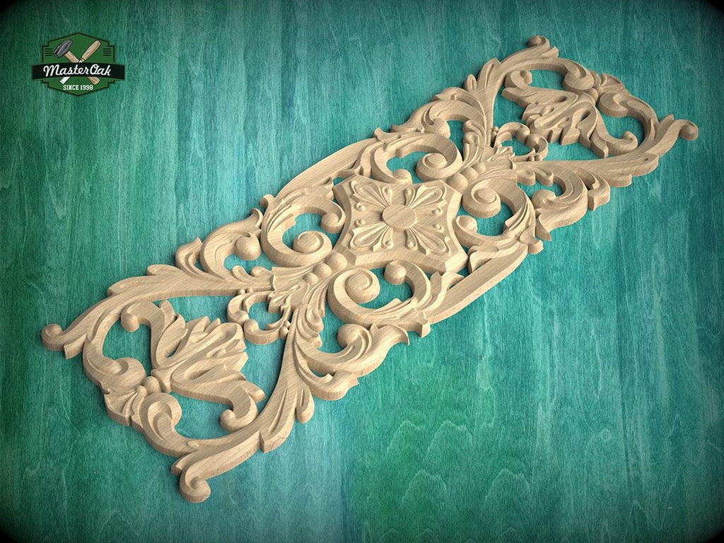 an ornate, carved wooden panel with intricate floral and scroll designs, set against a green background.