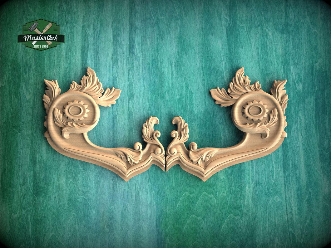 two ornate wooden handles with intricate carvings, displayed against a green textured background.