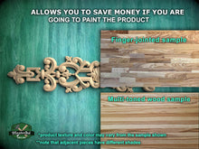 Load image into Gallery viewer, a picture of some wood carvings on a wall
