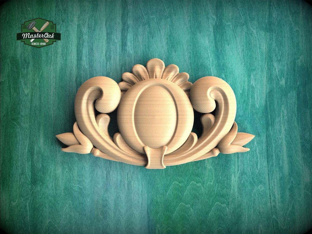 A wooden carving of an ornate, decorative piece is displayed against a green background.
