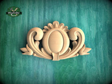 Load image into Gallery viewer, A wooden carving of an ornate, decorative piece is displayed against a green background.
