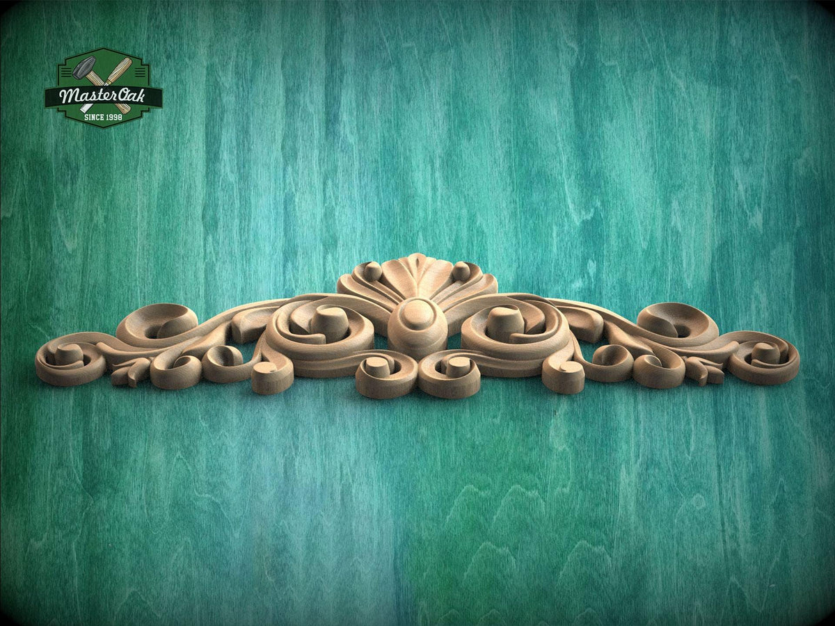 A decorative wooden carving with intricate scrollwork is displayed against a textured green background.