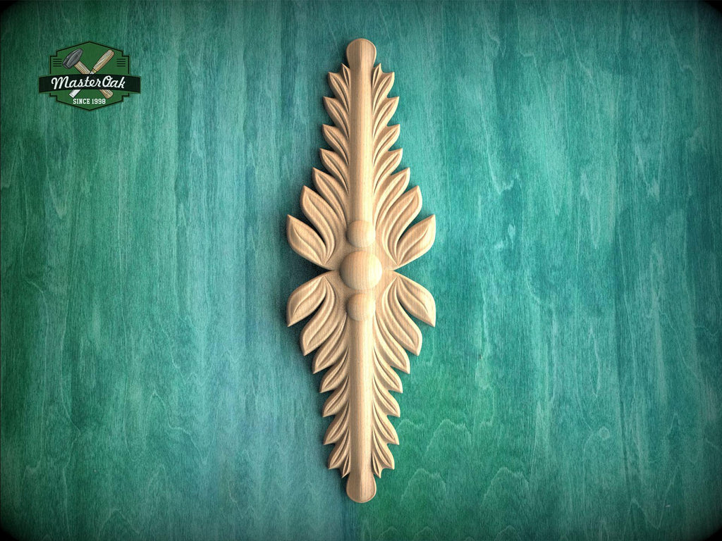 A decorative wooden leaf-like object is displayed against a green textured background.